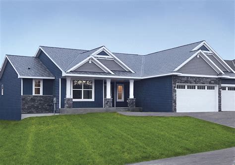 blue house metal roof|gray house with blue roof.